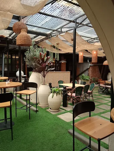 Indoor courtyard under glass roof at K'Osewe Westlands